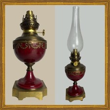 LAMPE A PETROLE 1900 - FAIENCE ROUGE CUIVRE ET BRONZE CISELÉ.