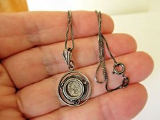 Ancien pendentif en argent