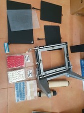 Titreuse pour films et photos adaptées aux visées reflex.