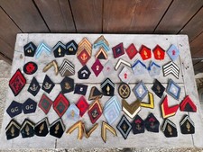 Lot insignes attributs tissus - insignes,