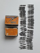 75 plumes neuves Baignol et