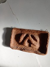 Bas-relief mural sculpté en bois – motif tête d’animal (style rustique artisanal