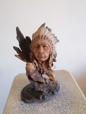 statue tête indien sur socle 