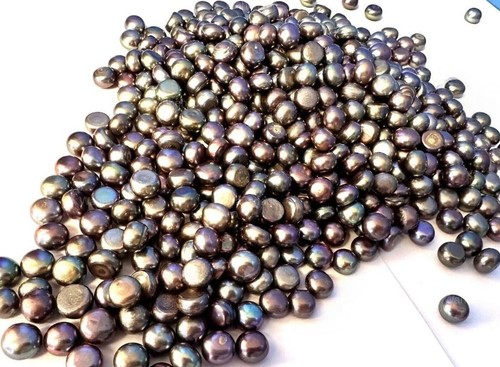 Natural black pearl - ct,