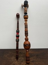 2 long ethnic pipes made of