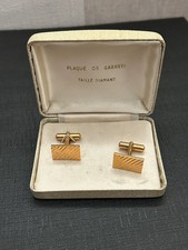 Ancienne paire de boutons de