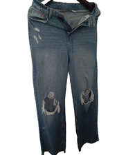 HM  jean troué à jambes