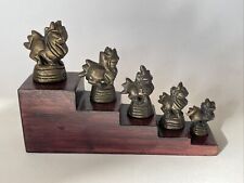 Série de 5 Statuettes, Poids