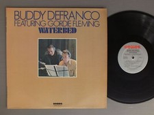 Buddy defranco featuring - buddy,