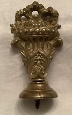 Embout de tringle rideau