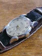 Montre REGLIA EB SWISS type militaire fonctionne  MANQUE l'aiguille secondes 