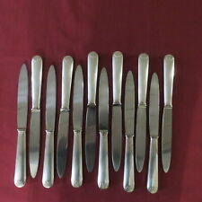 12 couteaux à entremet en métal  argenté platil modèle coquille lot 1