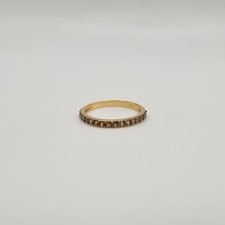 Demi-alliance or jaune 18 carats sertie de saphirs oranges