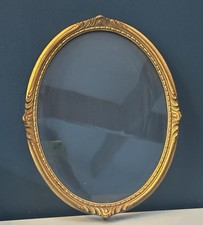 Cadre ancien ovale doré à la feuille d’or