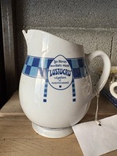 Pichet publicitaire ancien en faïence Lustucru damier bleu années 50