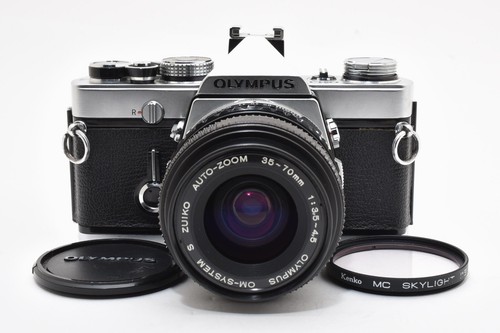 Mint olympus 1 - slr, 35mm