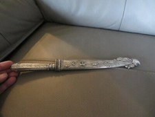 couteau sud- Américain de type Gaucho poignée et fourreau argent décor de vache