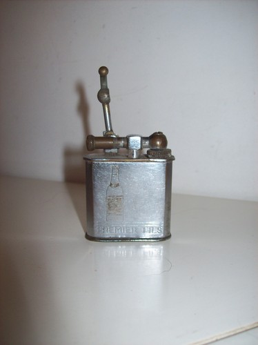 Ancien briquet publicitaire - , à