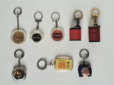 Lot de 8 porte-clés vintage Air France Kiwi Chocolat l´Union Sarel Curty Lyon