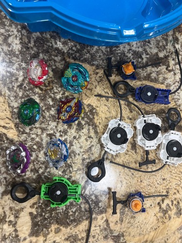 Beyblades and stadium - beyblades,