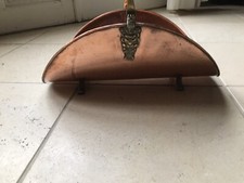 Porte buche en cuivre et pieds de lion en laiton pognée en céramique