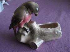 Perroquet/Perruche sur branche en céramique.