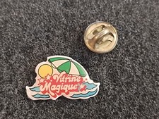 Pin's Vitrine Magique Plage