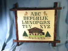 Superbe broderie au point de croix,abécédaire chalet de montagne vaches sapins