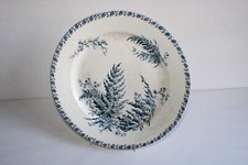 Plat rond ancien en faïence