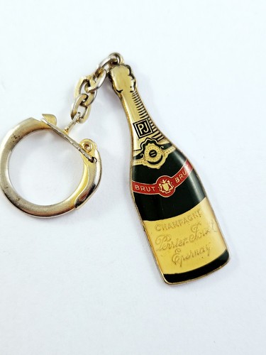 Porte cles champagne - -,