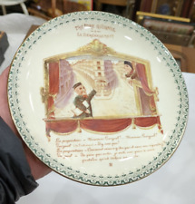assiette ancienne en faïence " Théatre de Guignol" le déménagement