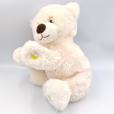 Peluche musical ours blanc
