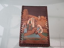 ALBUM DE PHOTOS EN CUIR .  1950.