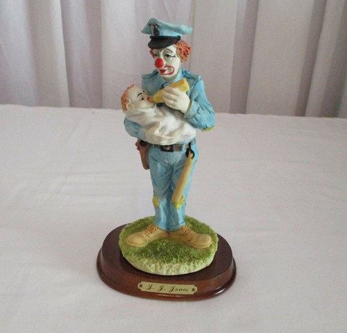Porcelain policeman clown j - ,