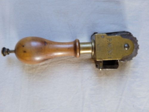 Ancien tampon mécanique - , en