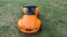 TROTTEUR VOITURE BABY RACER II ORANGE ET NOIR