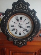 Horloge ancienne murale oeil