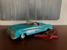 CABRIOLET ÉLECTRIQUE TÉLÉGUIDÉ EN TÔLE DE COULEUR TURQUOISE " JOUSTRA " L 33 cm