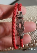 BRACELET JOAILLERIE boucle acier et zircons griffés sur cuir veritable. A saisir