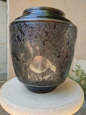 Vase en verre et feuille