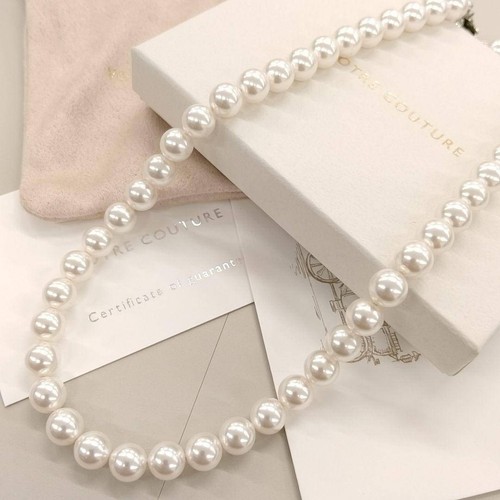 Collier perles blanches - de,