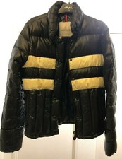 Authentique doudoune Moncler femme Taille 1 de couleur noir avec bandes blanches