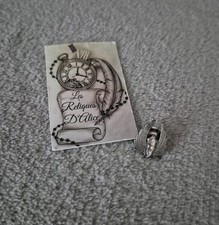 Insigne en réduction à visse