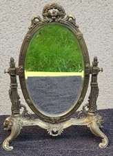 Ancien miroir de table ou coiffeuse verre biseauté avec tête de bouc et aigle