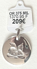 Médaille neuve or blanc 9
