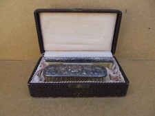 Ancien peigne et brosse en argent 800