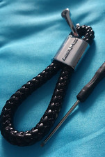 Porte clé AMG porte clé neuf sous blister cuir corde tresser