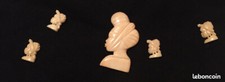 Bijoux  ethniques  ivoire africains anciens, décoratifs, motif "tête de femme " 