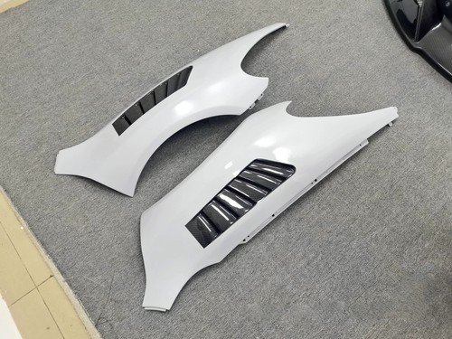 Half carbon fiber front - half, bumper