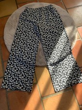 Pantalon noir t blanc large fluide tissu fin taille L Taille petit c'est un 38